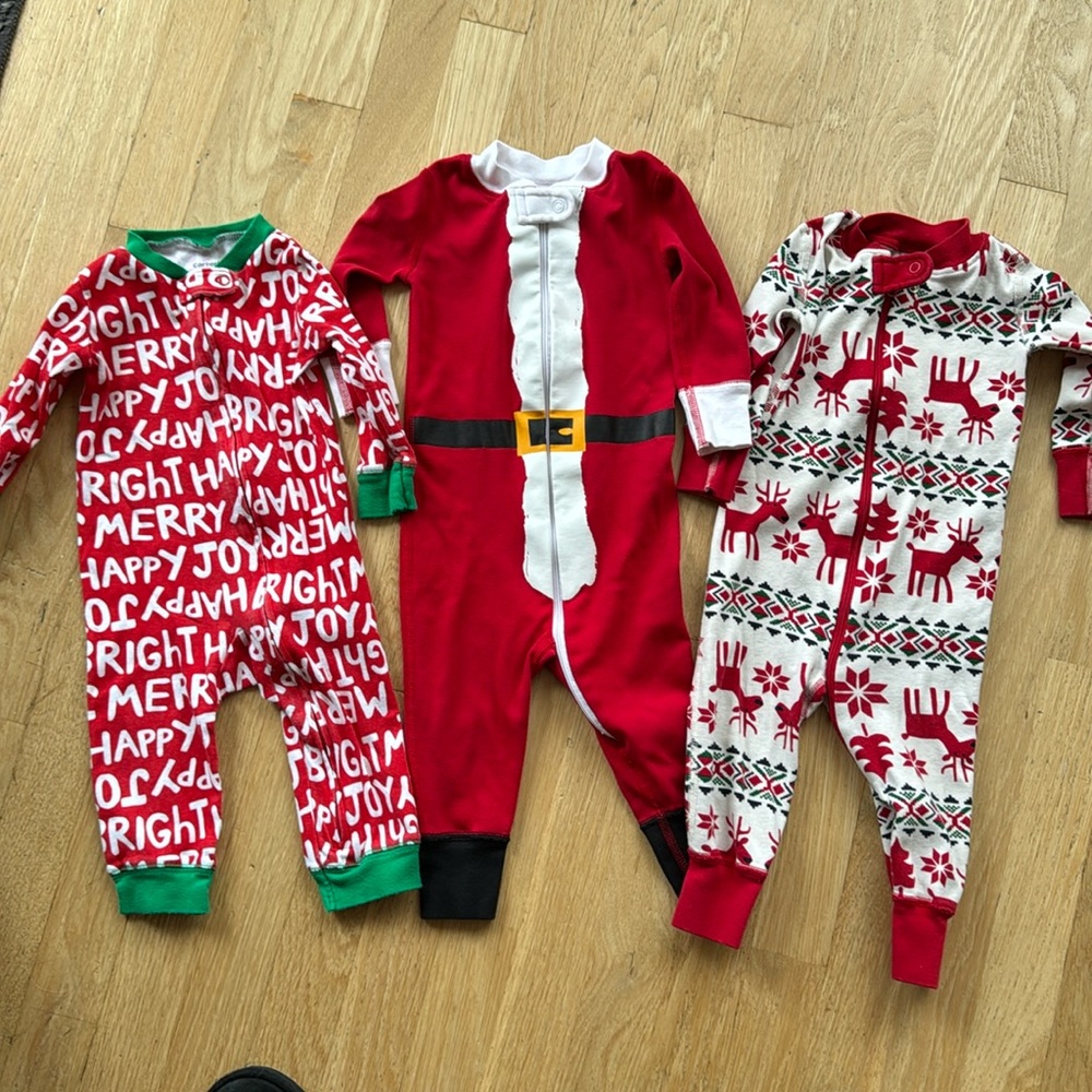 Three Christmas onesies
